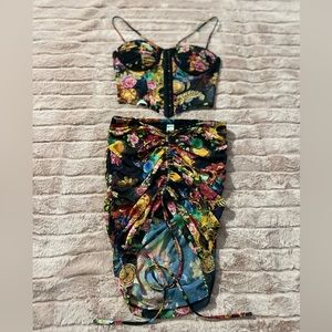 Sheer Black matching crop top and skirt.